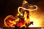 Wide shot of Ghost Rider with his flaming skull roaring, fire blazing through his head, standing on the Hell Cycle, and swinging a fiery chain whip against a fiery black background. Collector Edition (Prototype Shown) View 3