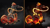 Two portraits of the Ghost Rider Premium Format™ Figure highlighting its light-up feature, illuminating the hellfire from his flaming skull to the base of his Hell Cycle. Collector Edition (Prototype Shown) View 9