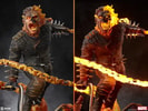 Two close-up portraits from the front of the Ghost Rider Premium Format™ Figure, highlighting its light-up feature that illuminates the hellfire from his flaming skull to the base of his Hell Cycle, with an alternate portrait showing the mid-transition from flesh to rider. Collector Edition (Prototype Shown) View 15