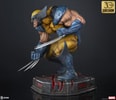 Left-angle view of Wolverine statue crouched low on display base, highlighting his berserker rage expression, detailed muscles, iconic claws. (Prototype Shown) View 11