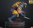 Right-angle view of Wolverine statue on a display base, deeply crouched, highlighting his fierce berserker rage expression, muscles, and iconic claws. (Prototype Shown) View 14