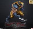 Right-angle view of Wolverine statue on a display base, deeply crouched, highlighting his fierce berserker rage expression, muscles, and iconic claws. (Prototype Shown) View 15