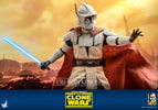 Half-body shot of Obi-Wan Kenobi in full white armor and a brown cape, extending his left arm with an open palm while holding a lightsaber in his right hand, set against a desert backdrop. (Prototype Shown) View 14