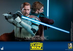 Left-angle view of Obi-Wan Kenobi holding a lightsaber horizontally with both hands, standing back-to-back with Anakin Skywalker, who holds his lightsaber vertically. (Prototype Shown) View 15