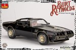 Burt Reynolds on Pontiac Firebird Trans Am 1980