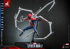 Wide shot of Peter Parker in Advanced Suit 2.0, hoisted in the air on a stand, in a wide stance with four silver-colored Spider-Man pincers extending from his back. (Prototype Shown) View 8