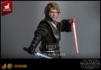 Half-body view of Anakin Skywalker™ (Artisan Edition) holding red lightsaber upside down in left hand, with black-gloved right hand holding blue lightsaber next to his torso. (Prototype Shown) View 16