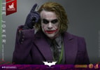 Upper body shot of The Joker (Artisan Edition) pointing up with his right hand while holding a knife, with his eyes looking to the side. Collector Edition (Prototype Shown) View 16