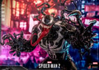 Dynamic Venom statue featuring detailed textures, sharp teeth, extended tongue, and an aggressive crouching pose on a rubble-themed base. (Prototype Shown) View 1