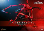 Action shot of Peter Parker (Superior Suit) airborne, right knee bent, left leg extended, with metallic red pincers positioned together in front. (Prototype Shown) View 1