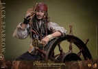 Half-body shot of Jack Sparrow (Collector Edition) with his left arm resting on the ship's steering wheel, looking through a tube telescope with his right hand, wearing a red bandana and without a coat. Collector Edition (Prototype Shown) View 16