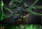 God Loki sitting on a gold throne, wearing his horned helmet and green cloak, with timeline effects and translucent accents, showing a menacing expression. Collector Edition (Prototype Shown) View 4