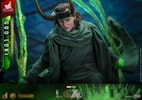 Left-angle view of God Loki lunging forward in classic attire and horned helmet, gripping timeline effects. (Prototype Shown) View 17