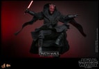 Action shot of Darth Maul (Collector Edition) in a crouched position in the air, wearing a black robe, with a menacing expression, holding a single-blade lightsaber in his right hand. Collector Edition (Prototype Shown) View 5