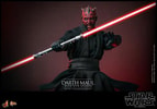 Half body shot of Darth Maul (Sith Speeder) in a wide stance, menacing expression, holding a red dual lightsaber horizontally with left arm pulled back. Collector Edition (Prototype Shown) View 18