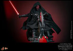 Full shot of Darth Maul (Sith Speeder) (Special Edition) on the Sith Speeder, holding a single-bladed lightsaber in his right hand, clutching the speeder's handle with his left hand, wearing a black hooded robe and a serious expression. (Prototype Shown) View 1
