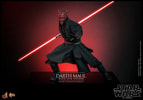 Half body shot of Darth Maul (Sith Speeder) (Special Edition) showing him in a slight crouch with his left palm extended in front, holding a dual lightsaber pulled back by his right side, with a menacing expression. (Prototype Shown) View 14