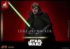 Left-angle view of Luke Skywalker™ (Dark Empire) holding a lightsaber with both hands in front of his body, wearing a serious facial expression. (Prototype Shown) View 7