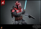 Half-body shot of Obi-Wan Kenobi™ in full Mandalorian™ armor, leaning right, holding a lightsaber and blaster pistol, looking to the right. (Prototype Shown) View 3