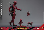 Wide shot of Deadpool Sixth Scale Action Figure by Hot Toys, walking with Babypool and Peggy, Headpool flying alongside, left hand pointing, swords on back. Collector Edition (Prototype Shown) View 9
