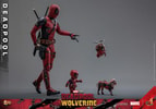 Wide shot of Deadpool Sixth Scale Action Figure by Hot Toys, walking with Babypool and Peggy, Headpool flying alongside, left hand pointing, swords on back. (Prototype Shown) View 10