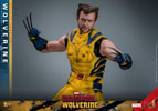 Wolverine Sixth Scale Action Figure by Hot Toys: half-body shot in damaged suit, no mask, arms widespread and slightly raised, claws out. (Prototype Shown) View 4
