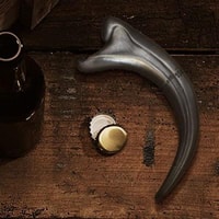Fossil Raptor Claw Metal Bottle Opener