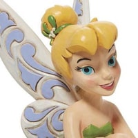 Tinkerbell Sitting on Holly