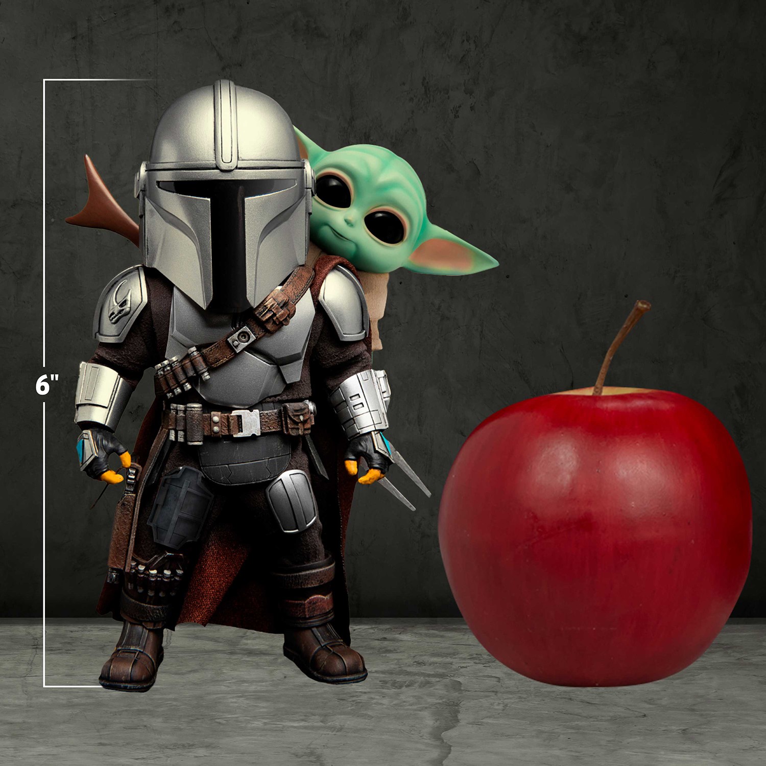 mandalorian holding baby yoda