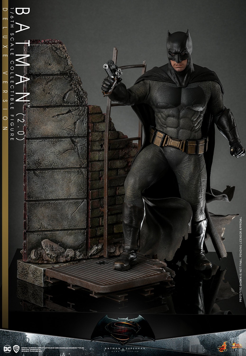 Full-body shot of Batman (2.0) on an alleyway diorama, in his full suit, pointing his grapple gun up with a dynamic pose. (Prototype Shown) View 3