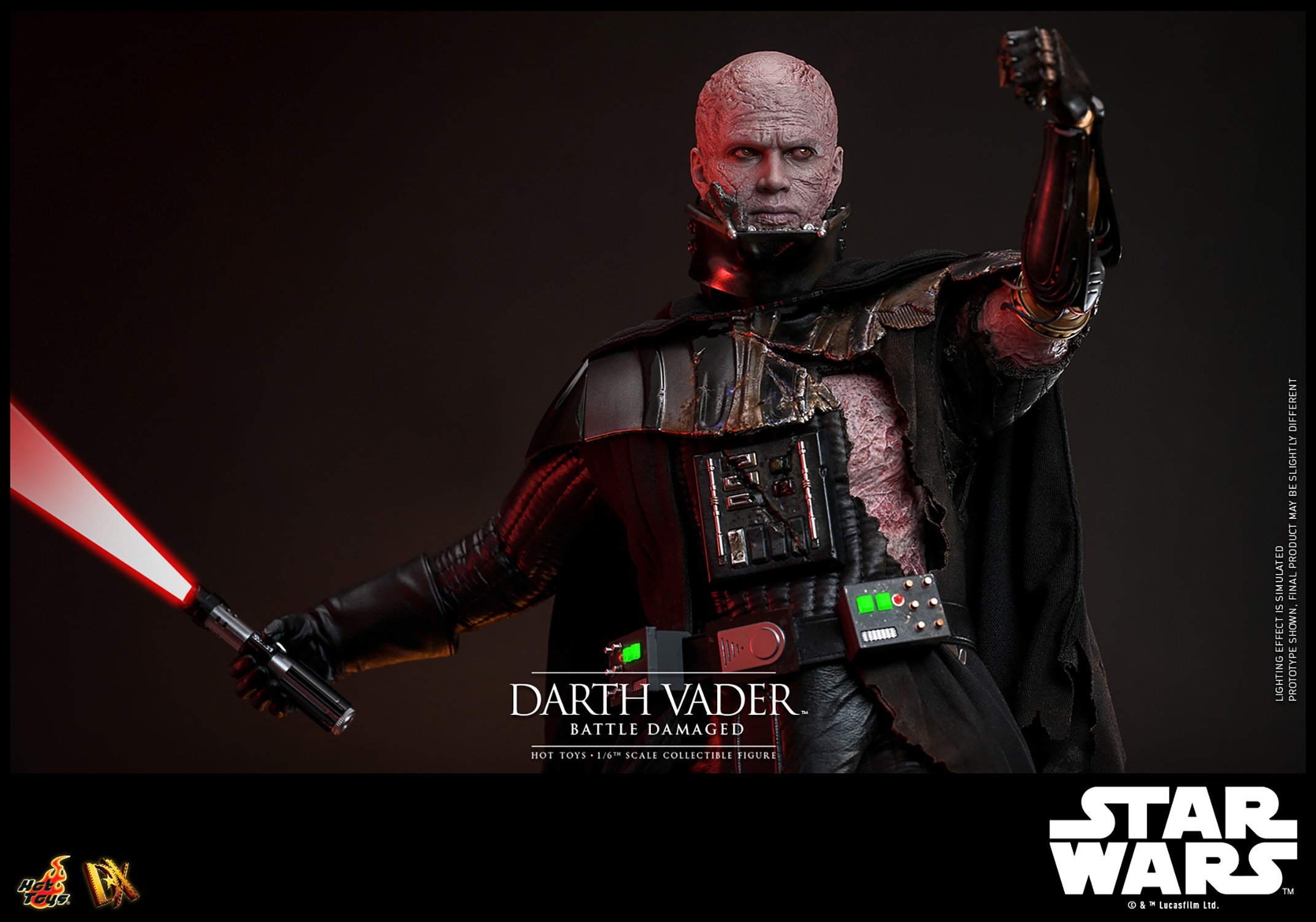 Half body shot of Darth Vader™ (Battle Damaged) unmasked, holding up a lightsaber in his right hand, and extending his mechno left arm. (Prototype Shown) View 9
