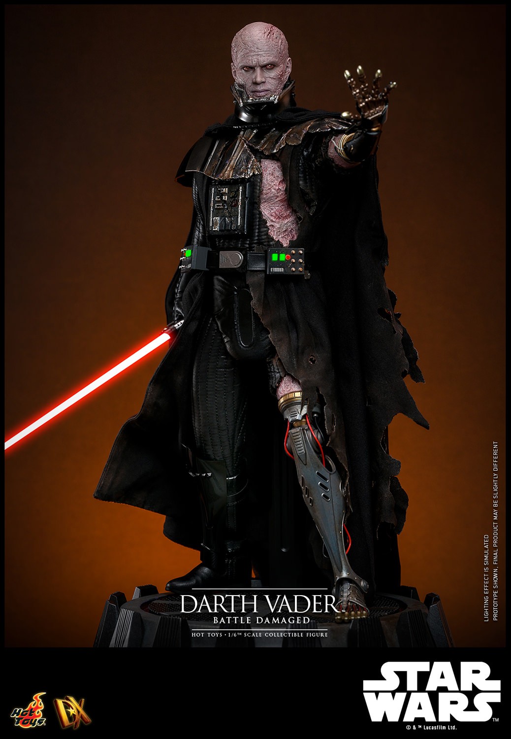 Left angle shot of Darth Vader™ (Battle Damaged) unmasked, displayed on a base, holding a lightsaber in his right hand, and extending his mechno left arm. (Prototype Shown) View 17