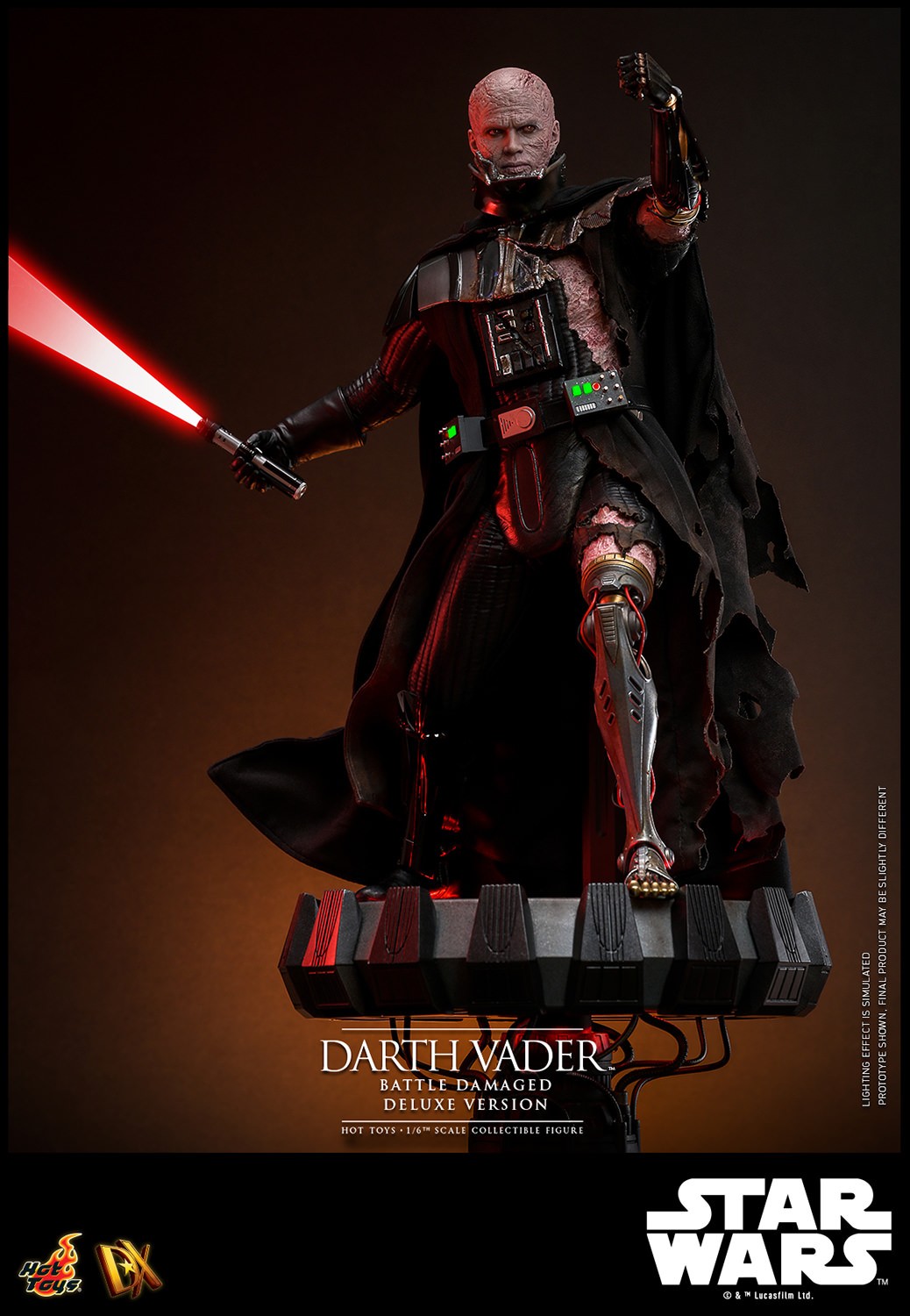 Lower left angle shot of Darth Vader™ (Battle Damaged) unmasked, displayed on a base, holding a lightsaber in his right hand, and extending his mechno left arm. (Prototype Shown) View 12