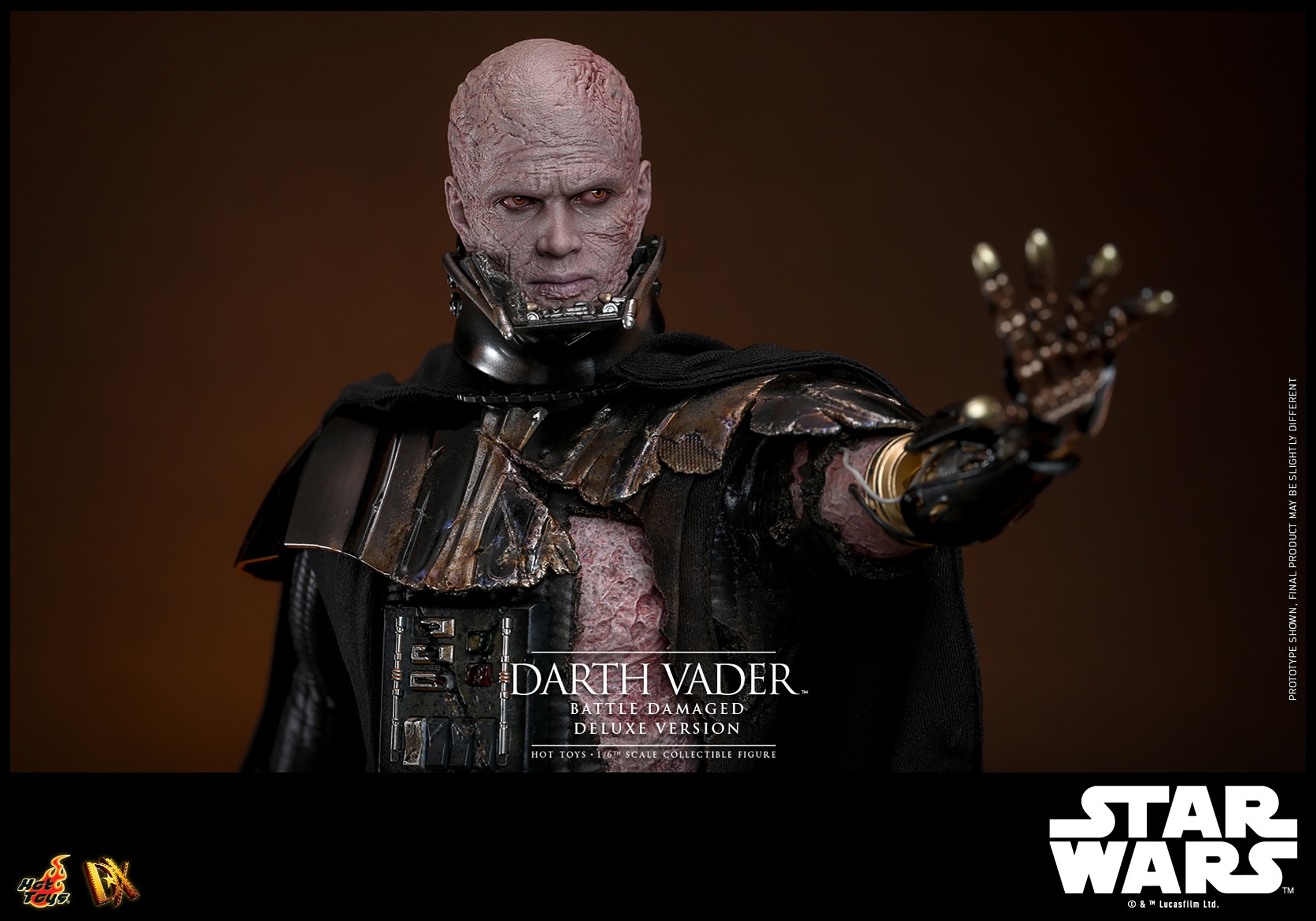 Right angle shot of Darth Vader™ (Battle Damaged) unmasked, highlighting his upper body with his mechno left arm extended. (Prototype Shown) View 21