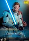 Half-body shot of Obi-Wan Kenobi, slightly leaning forward and looking down, wielding a blue lightsaber in front of his body. (Prototype Shown) View 1