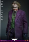 Knee-high shot of The Joker (Collector Edition) with his right leg slightly forward, holding a knife in his right hand. (Prototype Shown) View 13