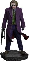 Full-body shot of The Joker (Collector Edition) standing with a machine gun in right hand, gloves on, head slightly down, on display base. (Prototype Shown) View 22
