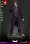 Full body shot of The Joker (Artisan Edition) standing on display base, slightly leaning forward, wearing black gloves, right finger pointing forward, and left hand holding cards at his side. Collector Edition (Prototype Shown) View 6