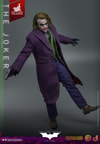 Full body shot of The Joker (Artisan Edition) with arms spread apart, holding a pistol in his right hand and left leg raised in the air. Collector Edition (Prototype Shown) View 10