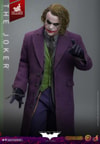 Knee-high shot of The Joker (Artisan Edition) with head slightly down, holding a butterfly knife in his right hand by his side, left arm up and pointing forward. Collector Edition (Prototype Shown) View 12