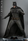 Left-angle view of Batman (2.0) in full suit, mid-lunge with a batarang in his right hand and his left hand gesturing dynamically forward. Collector Edition (Prototype Shown) View 3