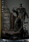 Full-body shot of Batman (2.0) on an alleyway diorama, in his full suit, pointing his grapple gun up with a dynamic pose. (Prototype Shown) View 3
