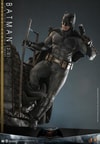 Full-body shot of Batman (2.0) hanging from an alleyway diorama with his right hand, holding a pistol in his left, looking left in action pose. (Prototype Shown) View 5