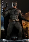 Full-body shot of Batman (2.0) stepping with his left leg, holding a pistol in his right hand, and showing a serious, determined expression. (Prototype Shown) View 8
