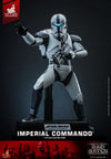 Full-body shot of Imperial Commando™ on display base in a wide stance, gesturing to his right while holding his blaster rifle in his left hand. (Prototype Shown) View 7