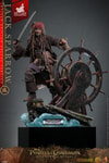 Full body shot of Jack Sparrow standing on a Black Pearl display, right leg perched up, holding a sword in his right hand and gripping the steering wheel with his left. (Prototype Shown) View 22