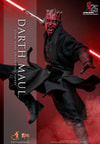 Action shot of Darth Maul (Collector Edition) leaping mid-air, right leg bent, holding a dual lightsaber in his right hand, with a menacing expression. Collector Edition (Prototype Shown) View 1