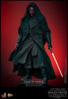Full body shot of Darth Maul (Sith Speeder) in a wide stance, wearing a black hooded robe and holding a red single-blade lightsaber in his left hand. Collector Edition (Prototype Shown) View 9