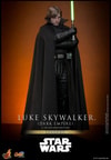 Full-body shot of Luke Skywalker™ (Dark Empire) with arms crossed, holding a lightsaber vertically in his right hand, showing a serious expression. (Prototype Shown) View 1
