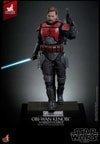 Full-body shot of Obi-Wan Kenobi™ on display base, holding a lightsaber and blaster pistol, with right leg forward and serious expression. (Prototype Shown) View 10